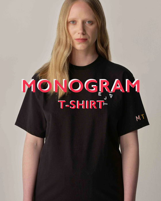 Monogram Unisex 'Kiss and Wink' Logo Tee in Black